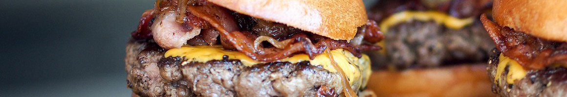 Eating Burger Hot Dog at Skinny's Restaurant restaurant in Hapeville, GA.